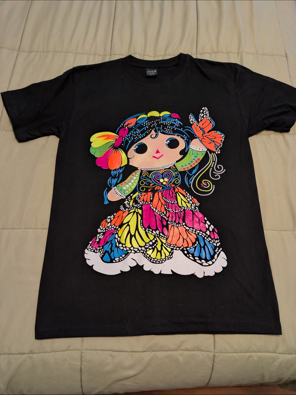 NEW Black T‑Shirt with Colorful Doll Graphic, Medium